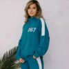 девушка в синем костюме из игры кальмара